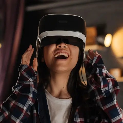 Person watching in-game advertising in a VR headset