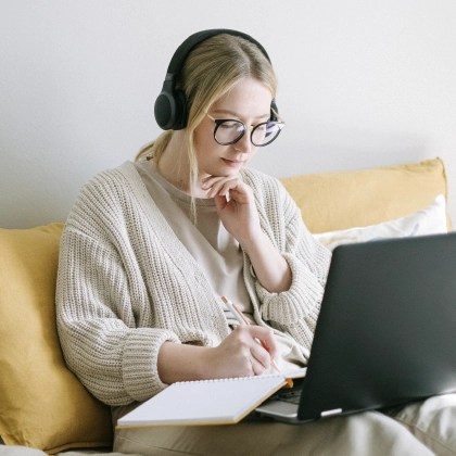 woman looking at her laptop